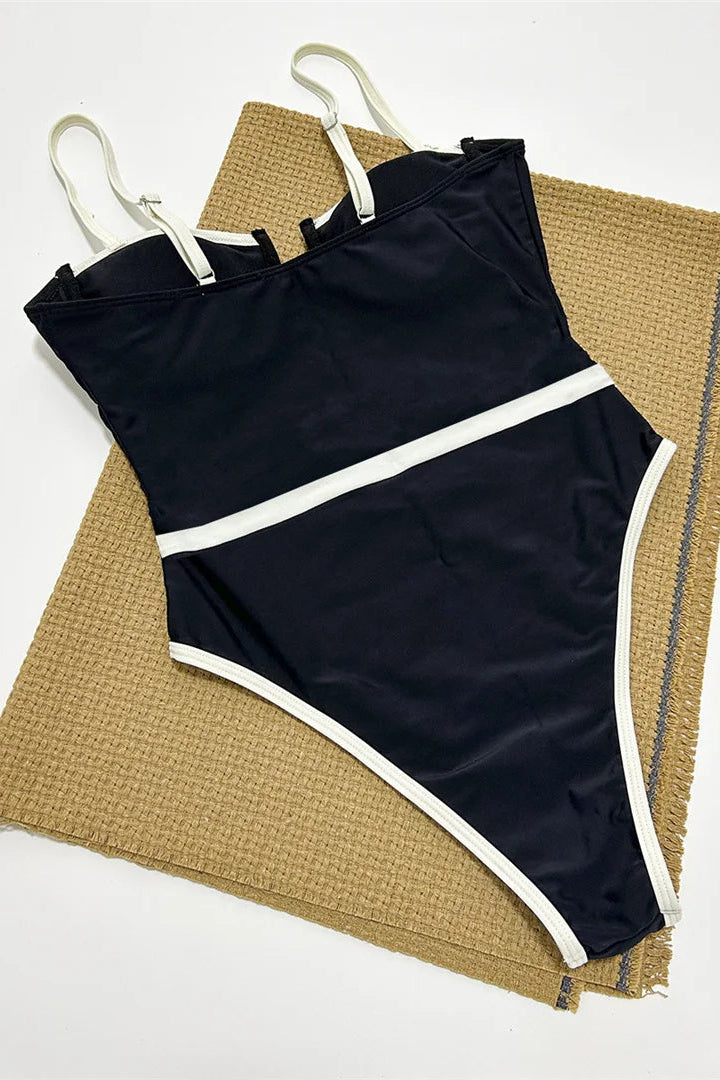A versatile underwire padded black and white one-piece 