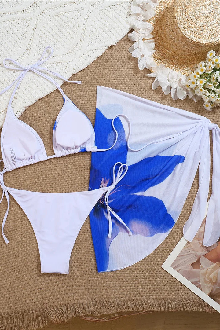 Bikini set with blue floral design and white straps