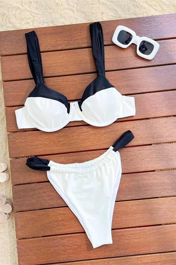 Black and white bikini set Trendy low-rise bottoms offer a sleek and flattering silhouette