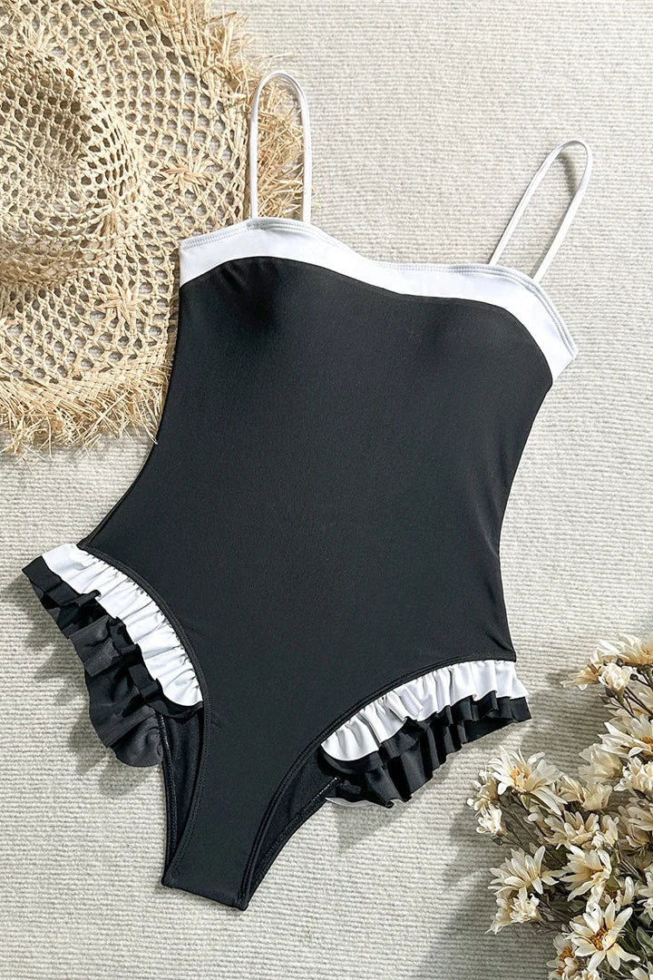 Black and white trim swimsuit one piece
