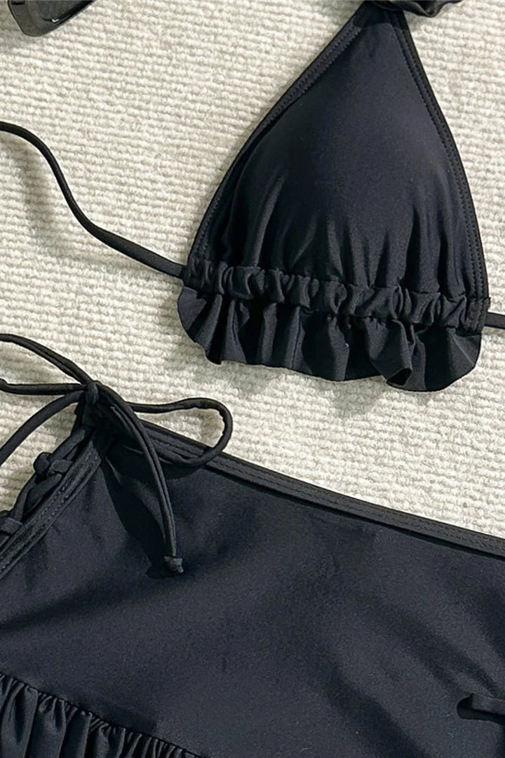 Black bikini top and cover up skirt