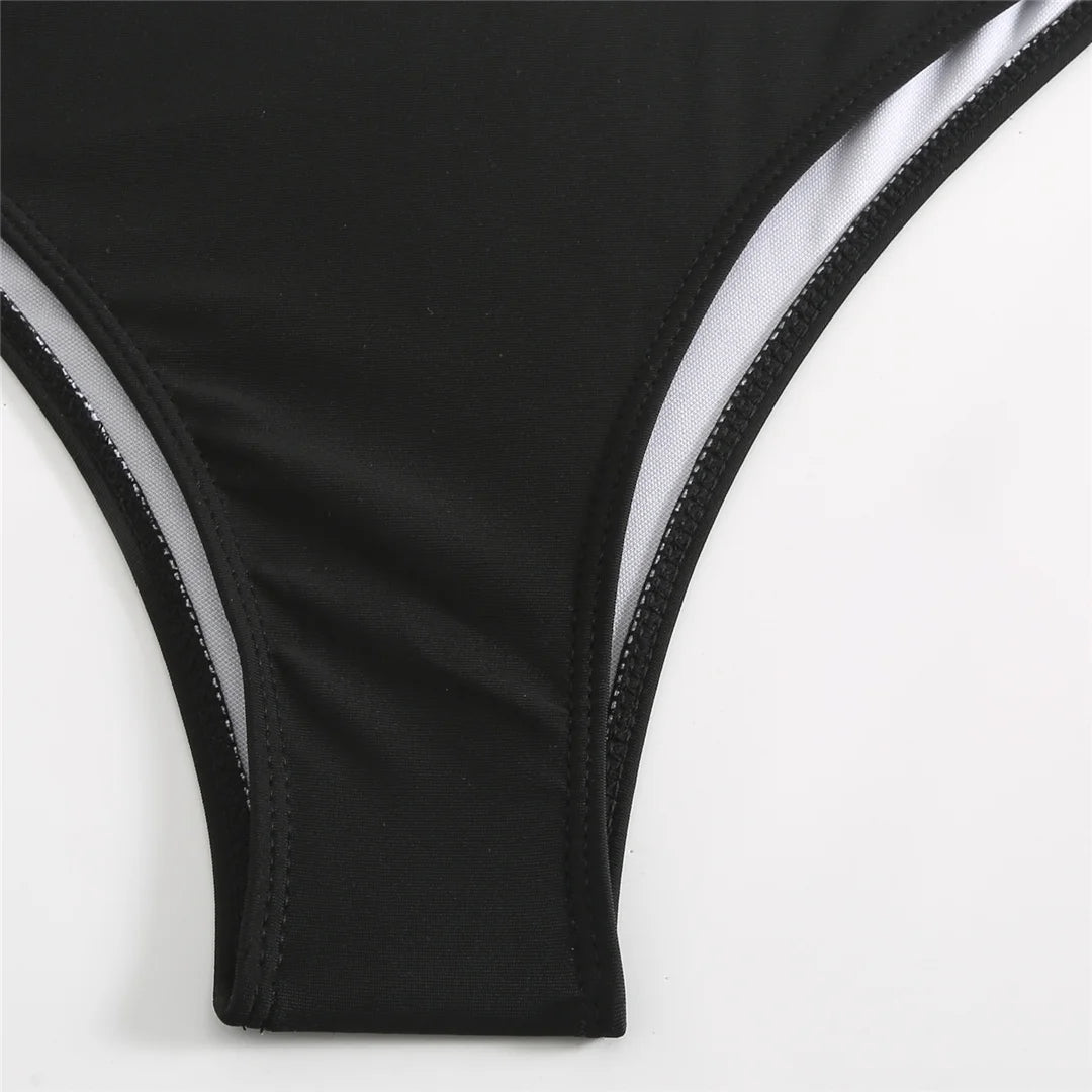 Black swimsuit bottom Low-rise waistline offers modern flattering fit with moderate coverage,
