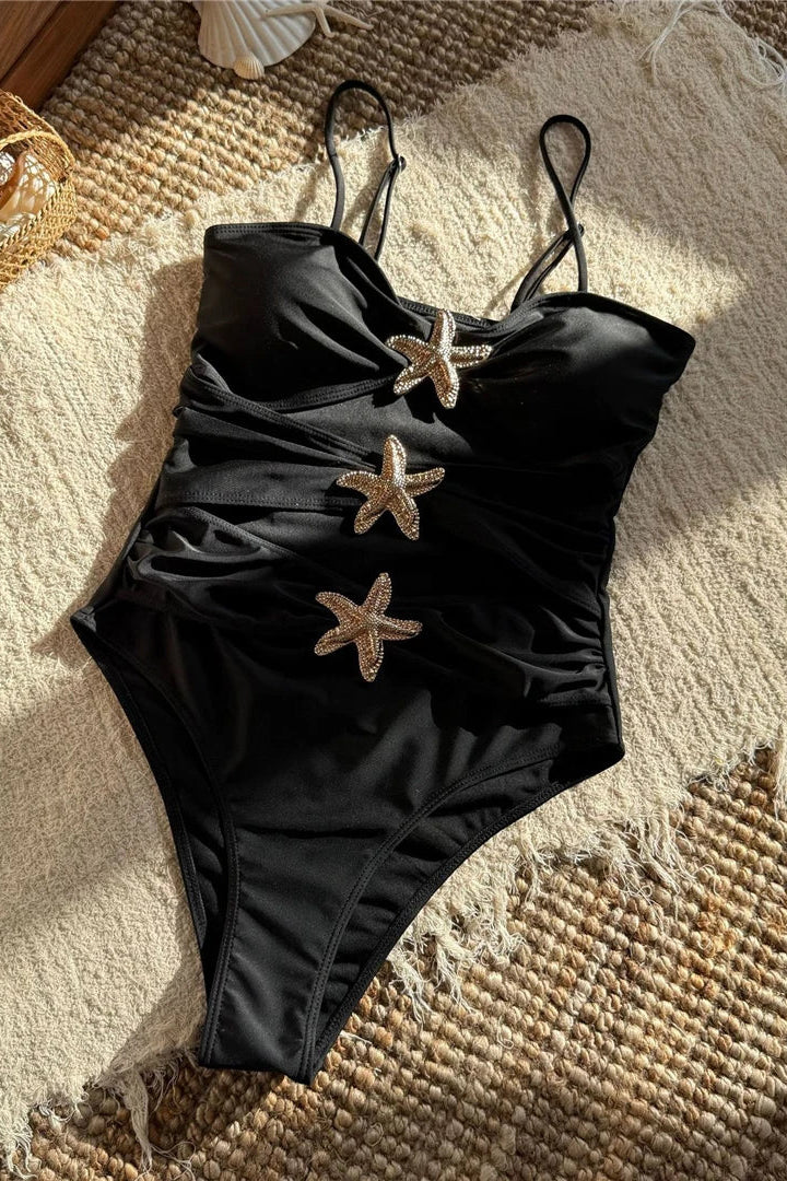 Black swimsuit with starfish embellishments