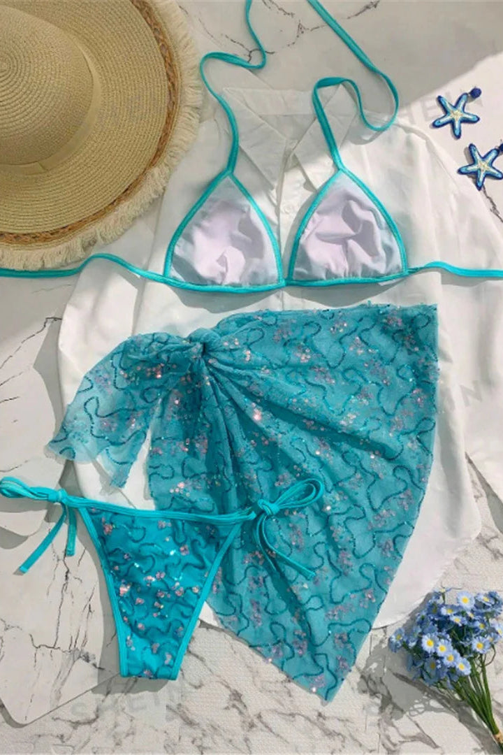 Blue bikini set with matching mini sarong cover up