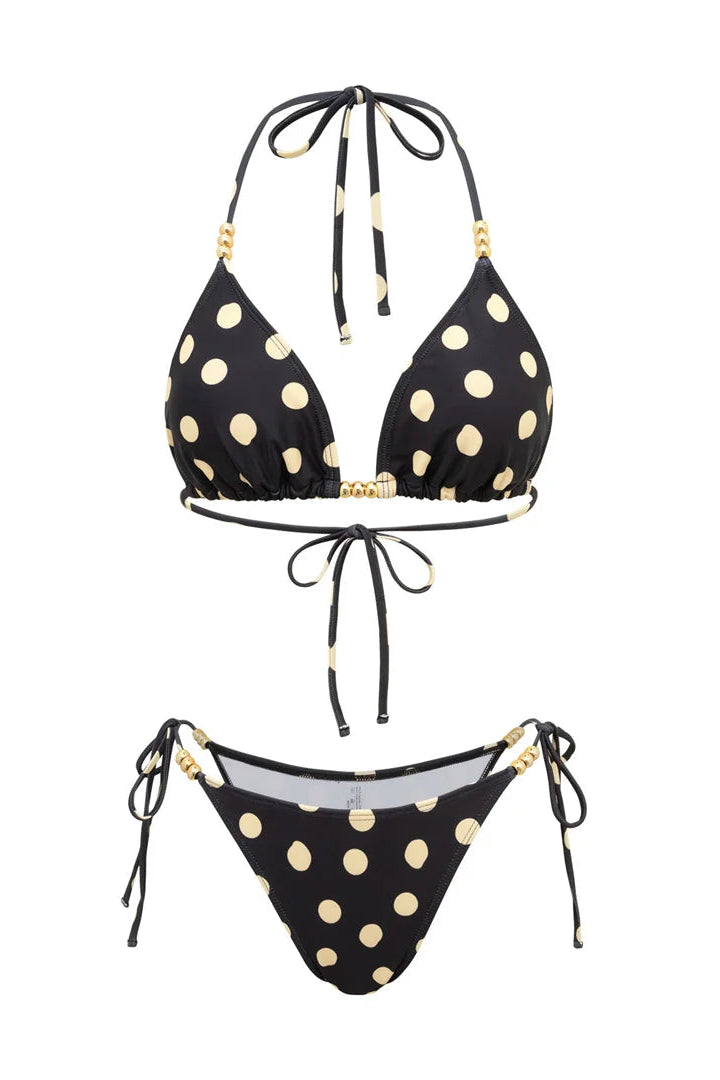 Brown bikini set with gold polka dots on a white background