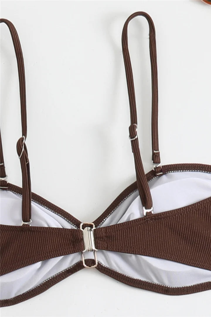 Brown bikini top on a white background