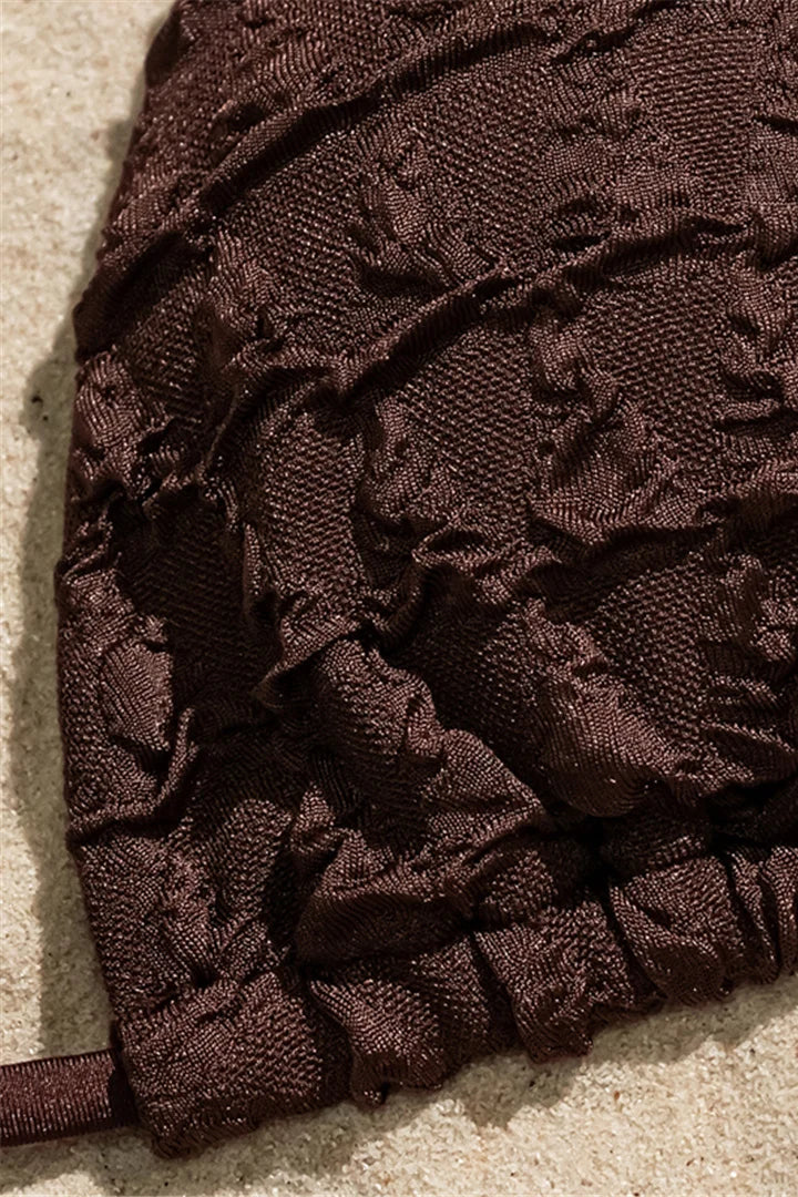 Close-up of brown bikini halter neck padded top