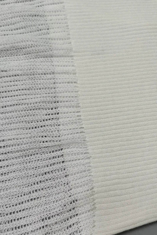 Close-up of textured gray and white fabric