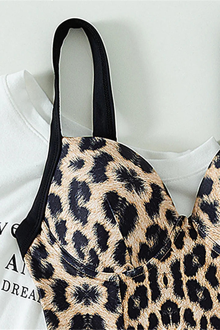 Close up of Leopard print monokini with black straps 