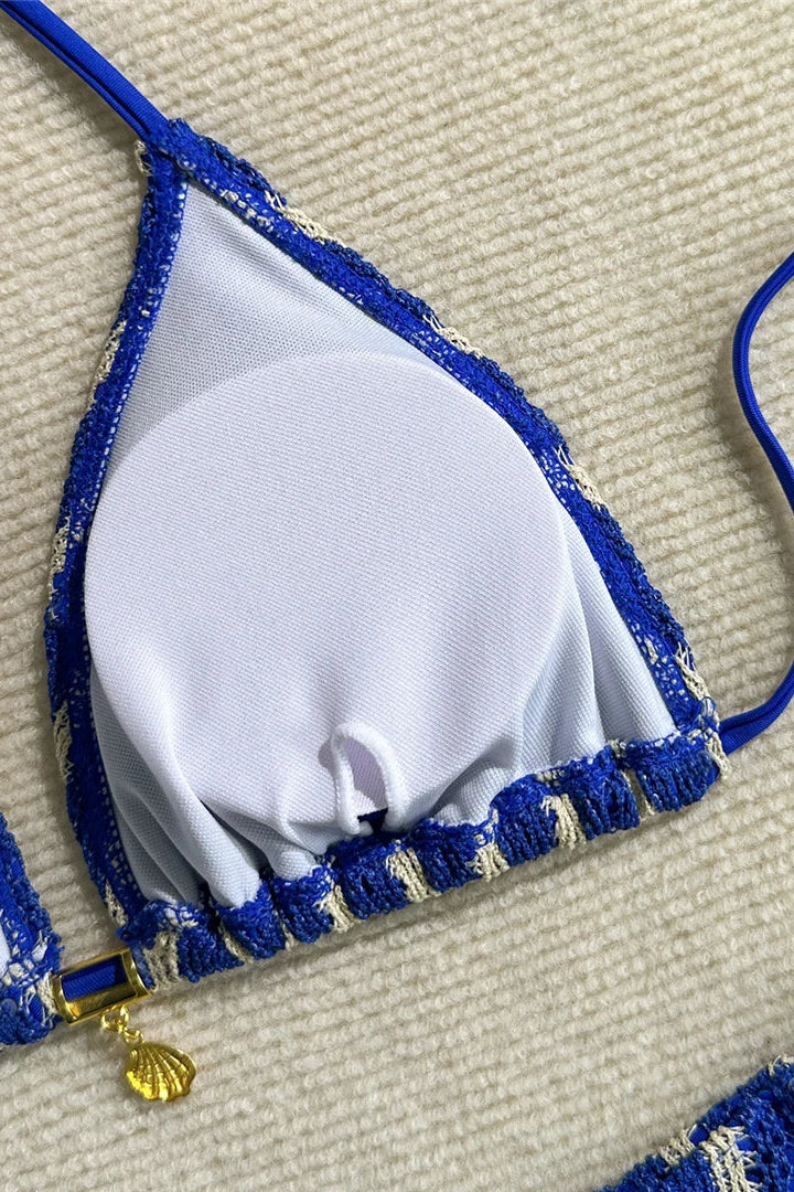 Close up of padded blue and beige bikini top 