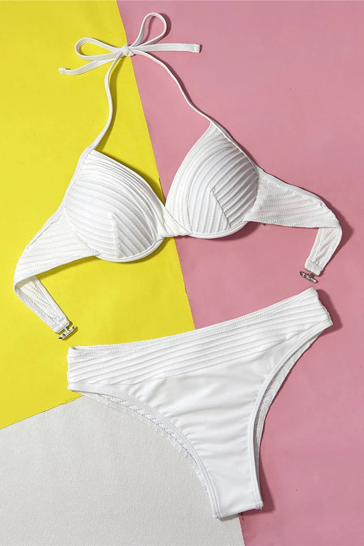 Crafted from soft polyamide, polyester, and elastane for flexibility, durability, and quick-drying comfor