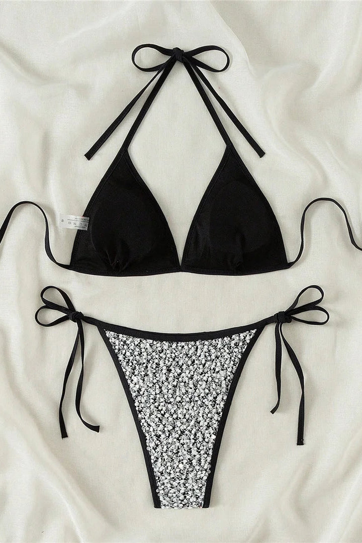 Crafted from soft polyamide, polyester, and elastane ideal for vacations, beach parties, and summer swimwear.
