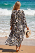 Elegant V-neckline front adds a feminine touch to this relaxed kaftan, creating an effortless look for beach holidays