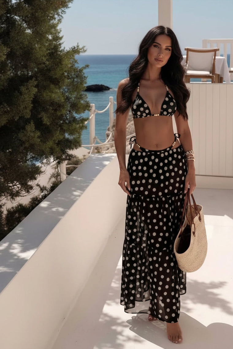 Feminine halter neckline creates a flattering swimwear silhouette, ideal for beach holidays, poolside lounging, and tropical getaways.