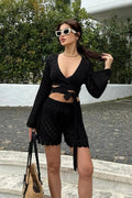 Flowy bell sleeves provide graceful movement and boho-inspired charm