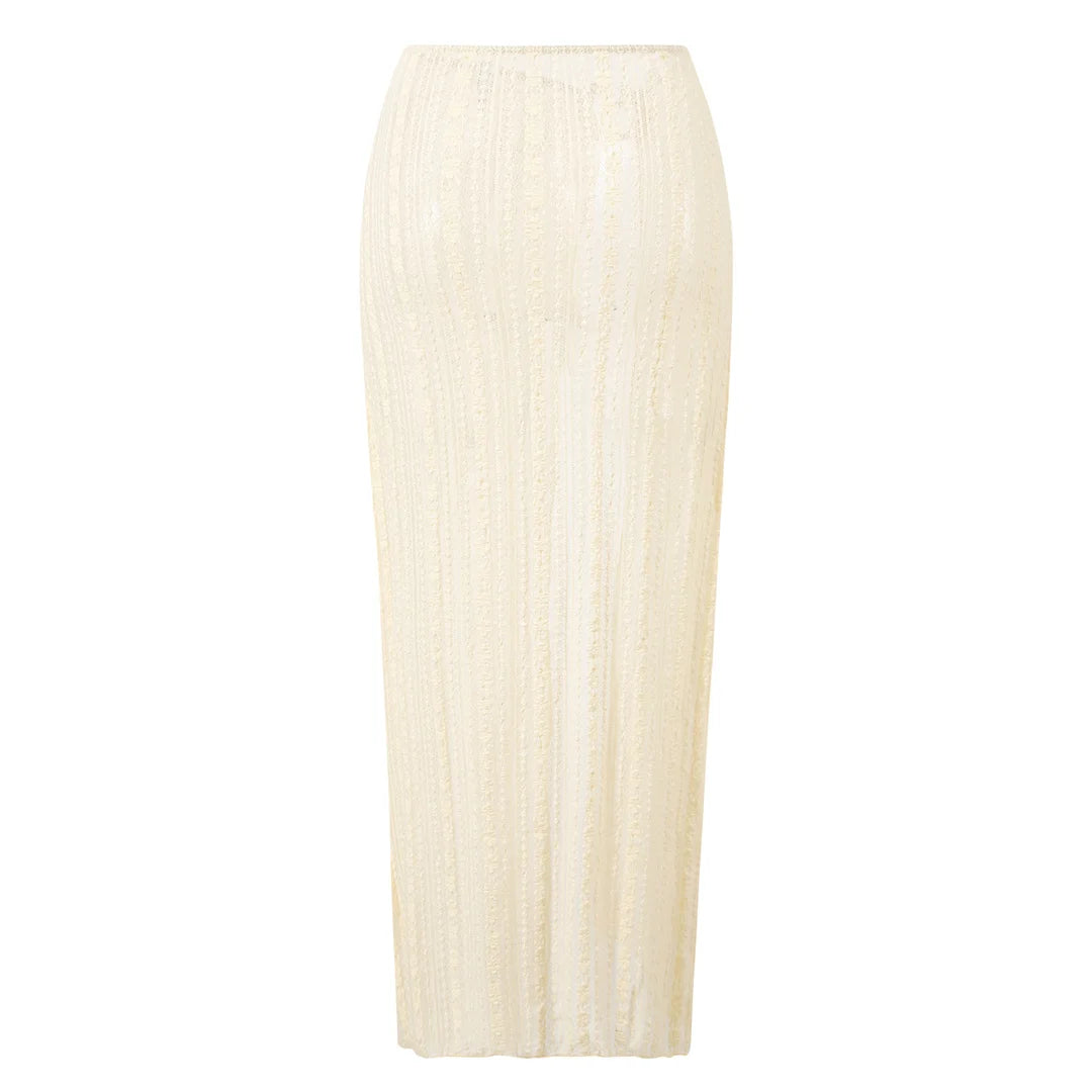 Flowy long sarong serves as a lightweight beach cover up or graceful resort wear layer over bikini.