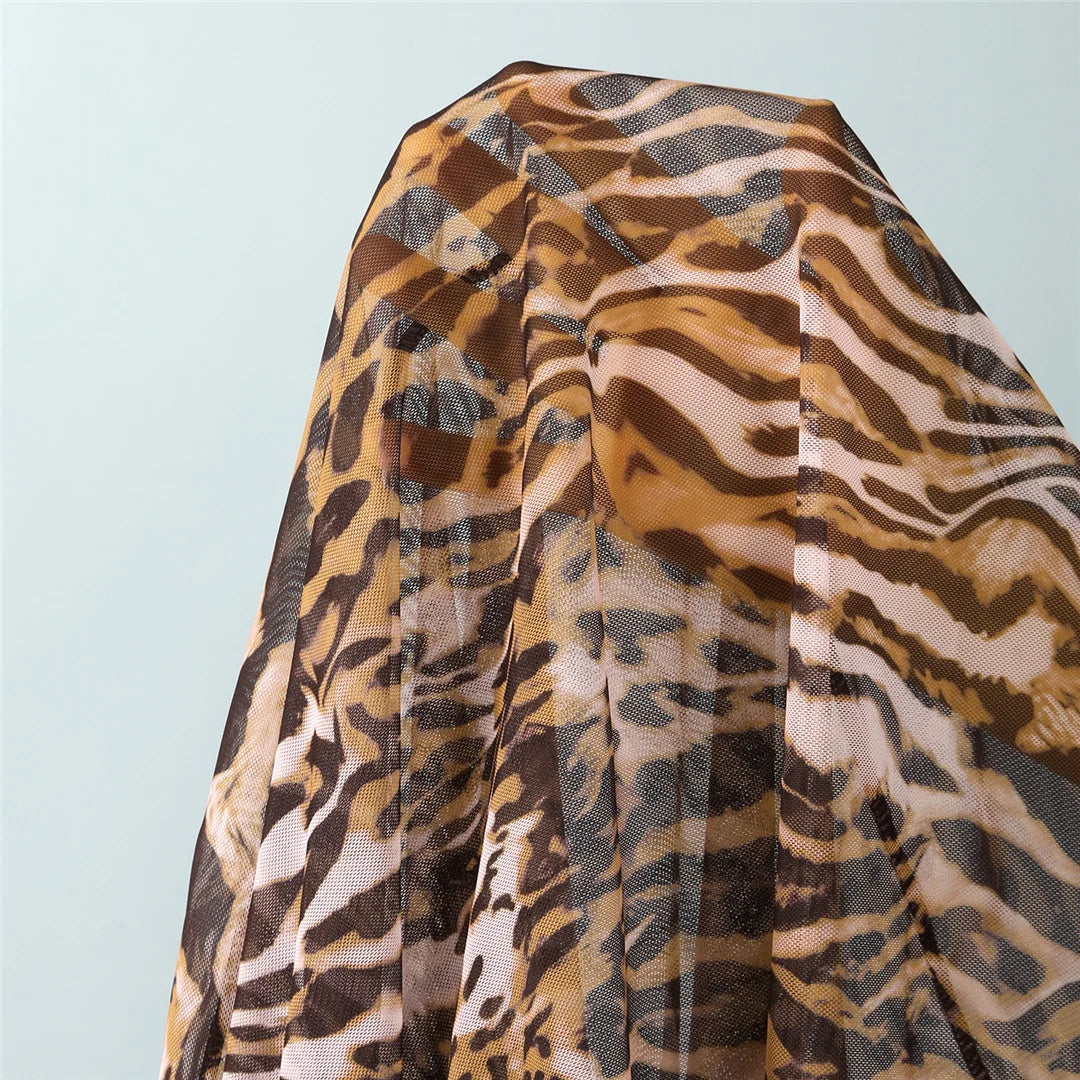Flowy sarong in coordinating leopard print offers easy tie-on versatility and breezy coverage