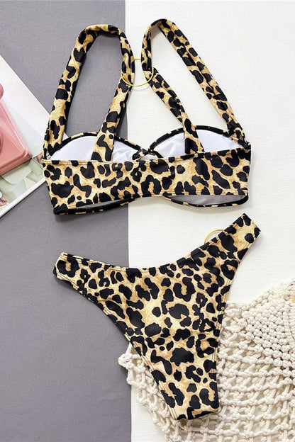 Leopard print bikini set on a gray and white background 