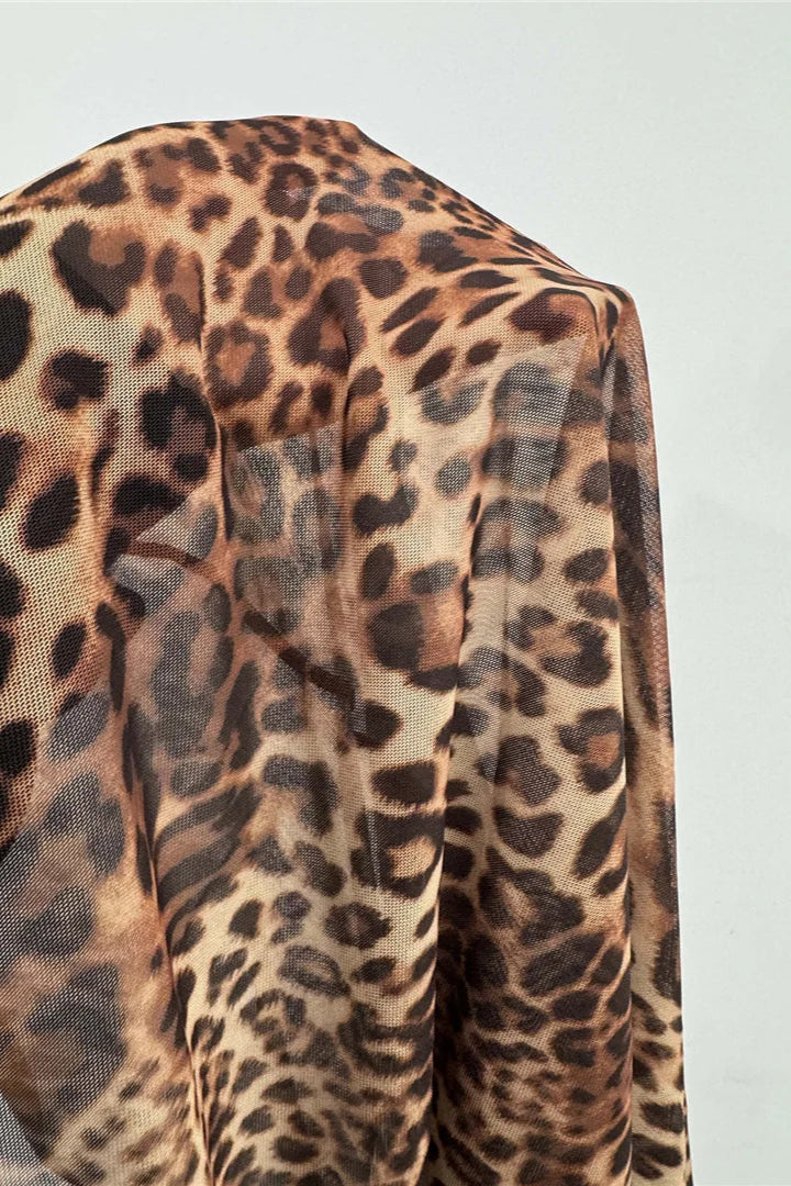 Leopard print fabric on a light gray background