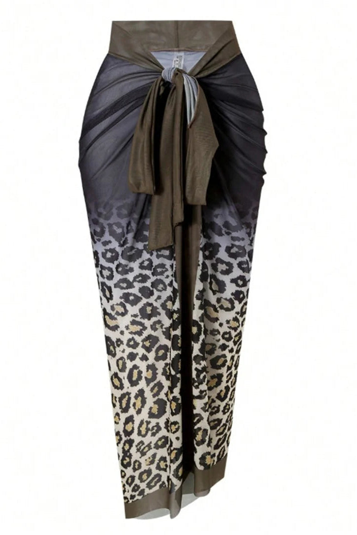 Long, patterned sarong skirt with a leopard print design on a white background