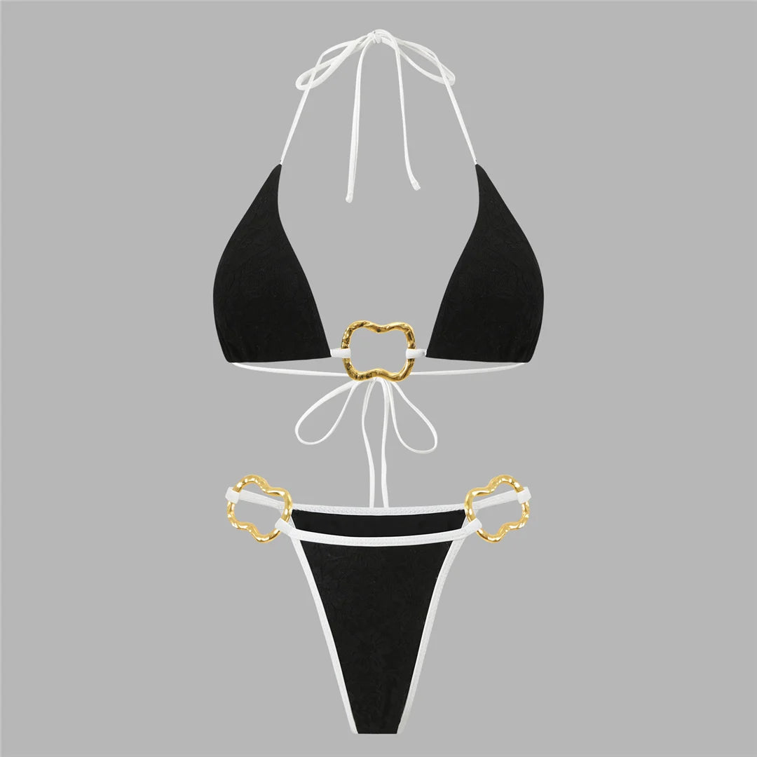 Low-rise black bottom enhanced with sleek metal detail provides modern flattering coverage