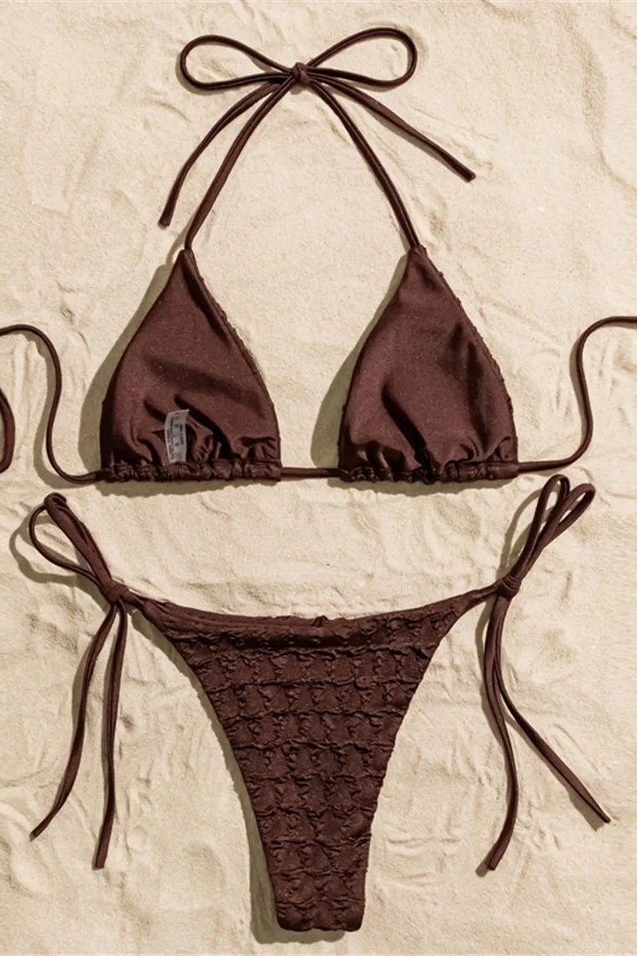 Low-rise bottoms with lace-up detailing add an adjustable and fashion-forward touch.