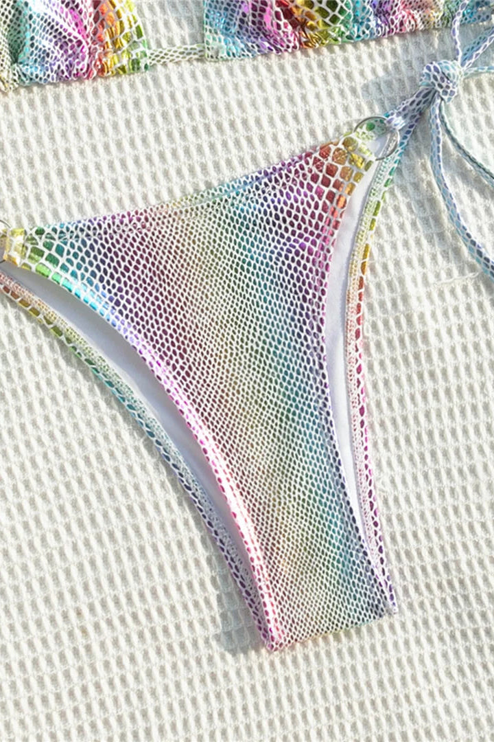 Multicolored mesh bikini bottom on a textured white background