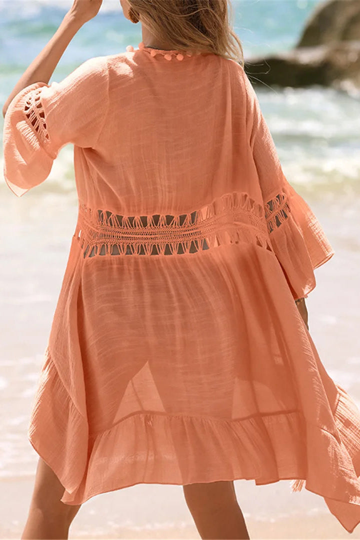 Provides flattering coverage ideal as a versatile vacation beach dress or poolside layer.