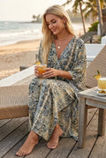 Stylish maxi-length beach kaftan featuring a bold snake print and flowing silhouette