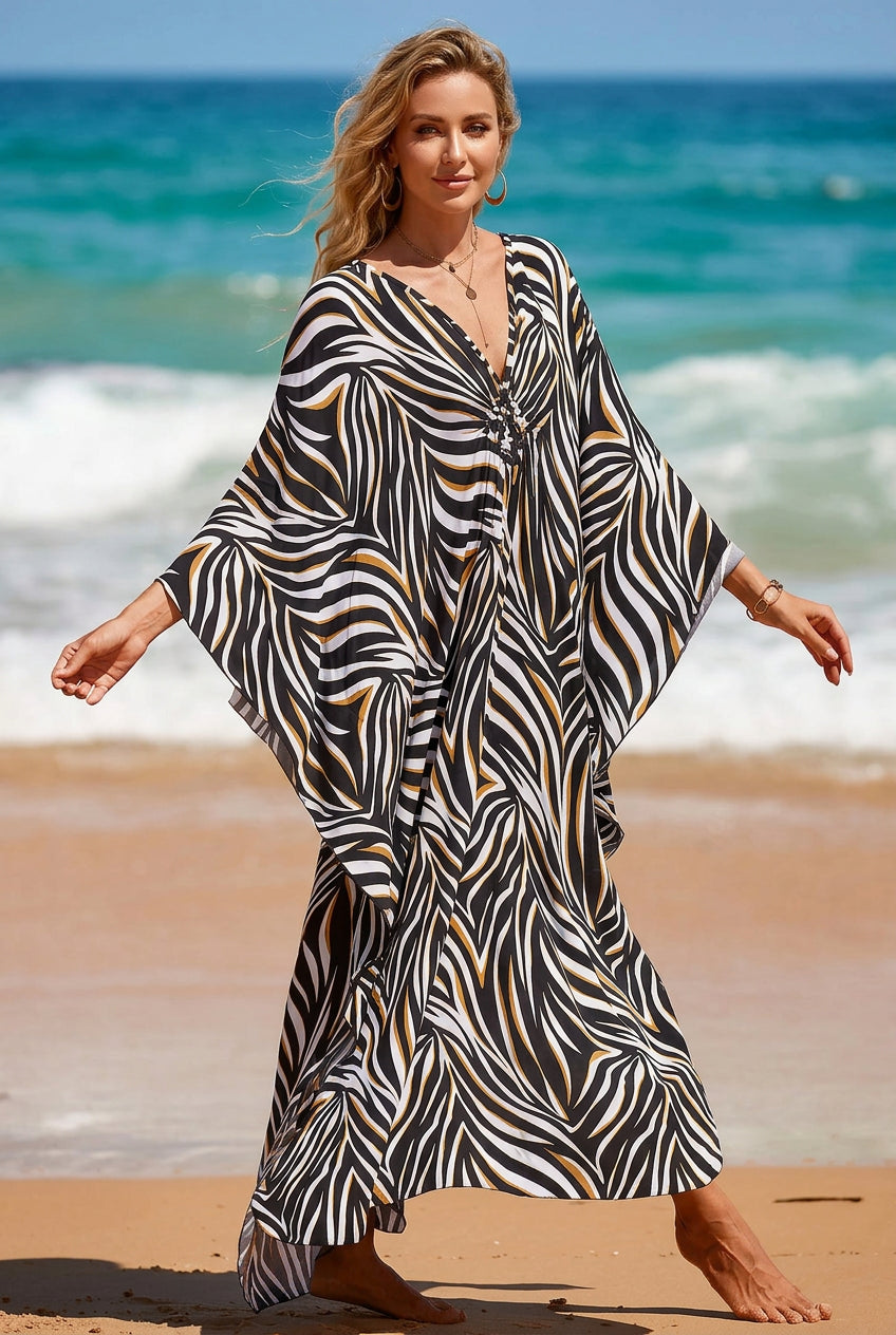 Stylish maxi-length beach kaftan featuring a bold stripe print and flowing silhouette