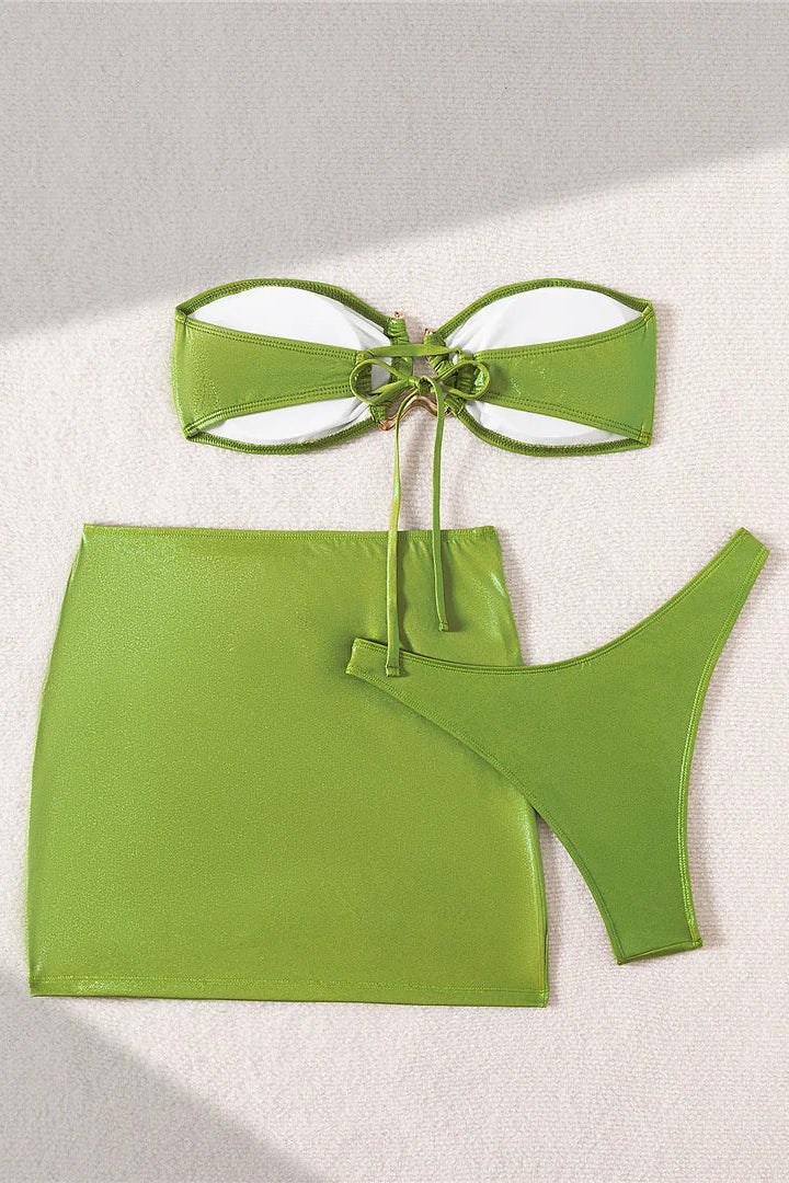Trendy low-rise Brazilian-style bikini bottoms create a flattering, figure-enhancing silhouette for summer swimwear looks.