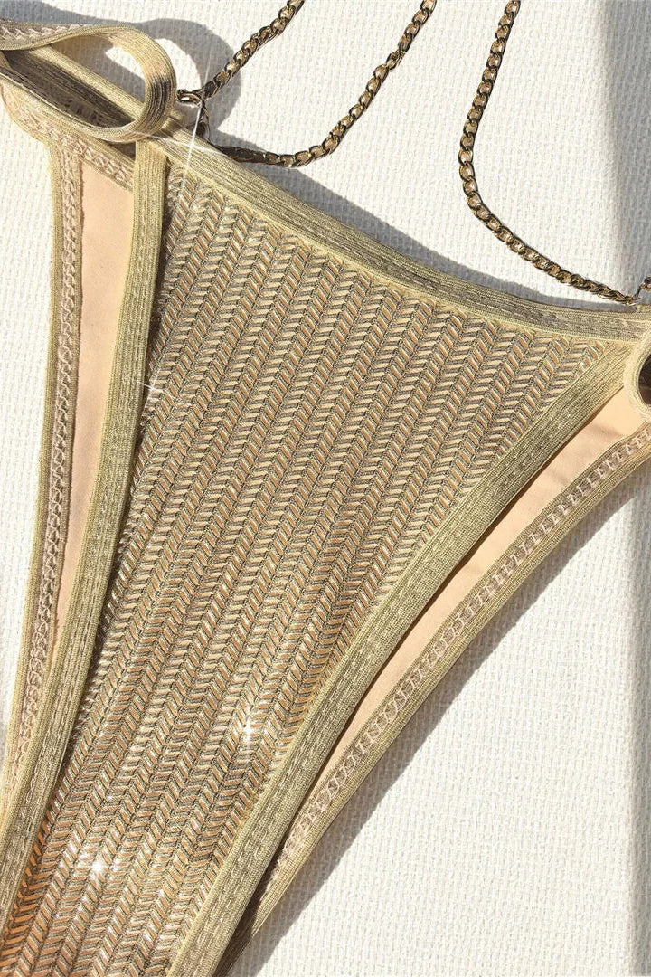 Trendy low-rise bikini bottoms with lace-up design create an adjustable, figure-enhancing silhouette.