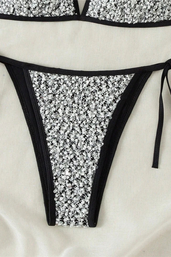 Trendy low-rise bikini bottoms with lace-up detailing