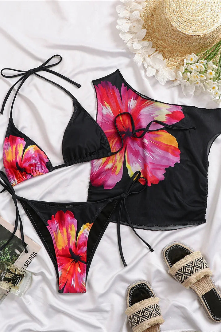 Trendy low-rise bikini bottoms with lace-up detailing provide a flattering and fashion-forward fit.