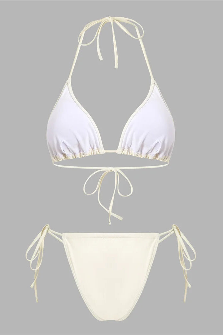 White bikini set with adjustable fit for beach days and poolside lounging.