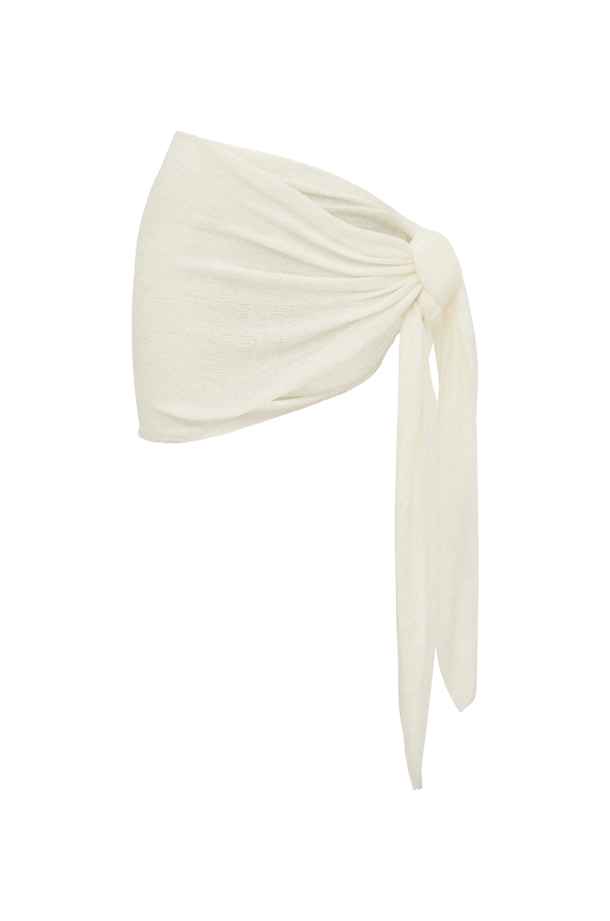 White sarong cover up skirt tied in a knot on a white background