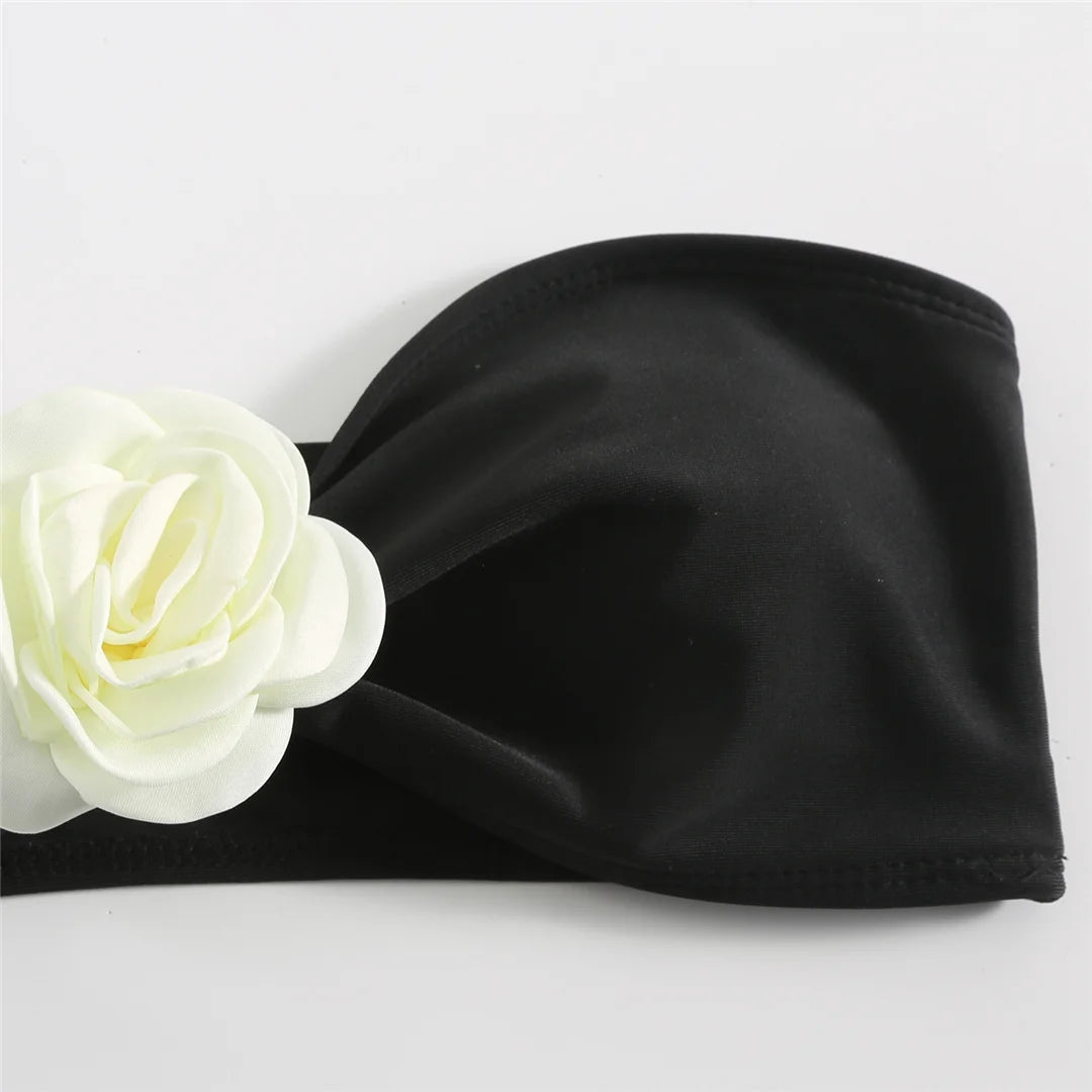 Wire-free bandeau style adorned with eye-catching 3D floral accents