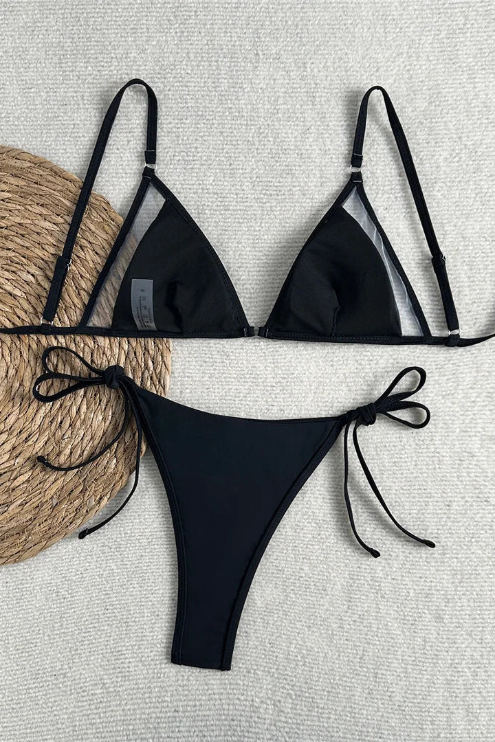 Wire-free bikini top with padding, crafted from polyester and elastane for stretch, durability, and quick-drying swimwear comfort.