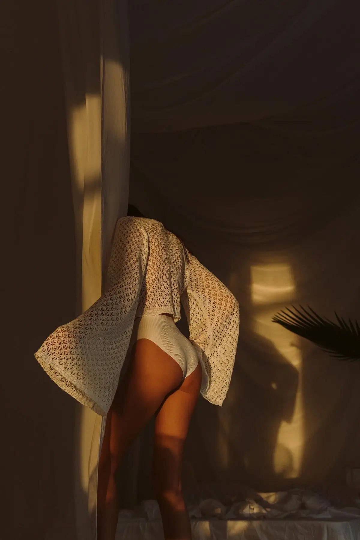 Women wearing a textured dress with a blurred background