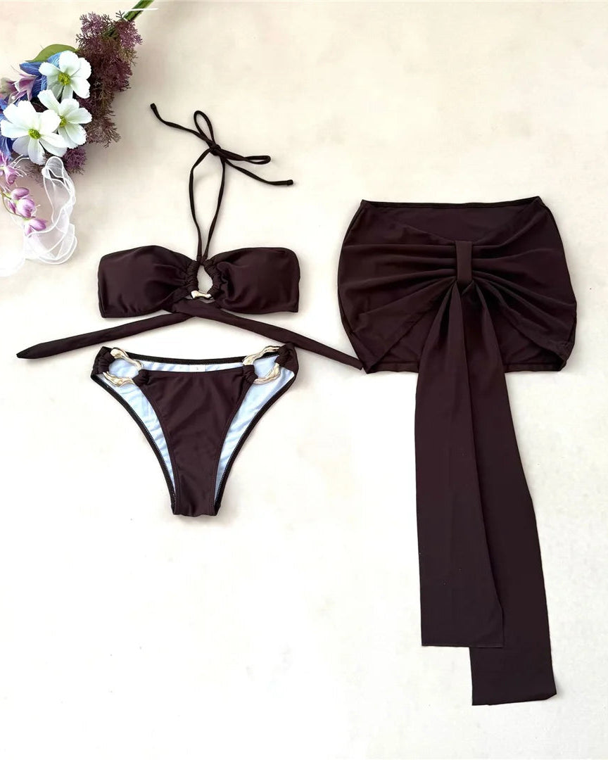 brown bikini set with a large bow on a light background