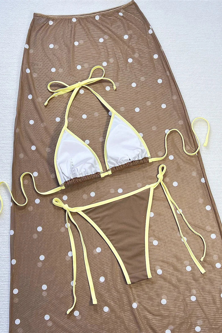 low-waist lace-up bottom, and sheer polka dot mesh skirt