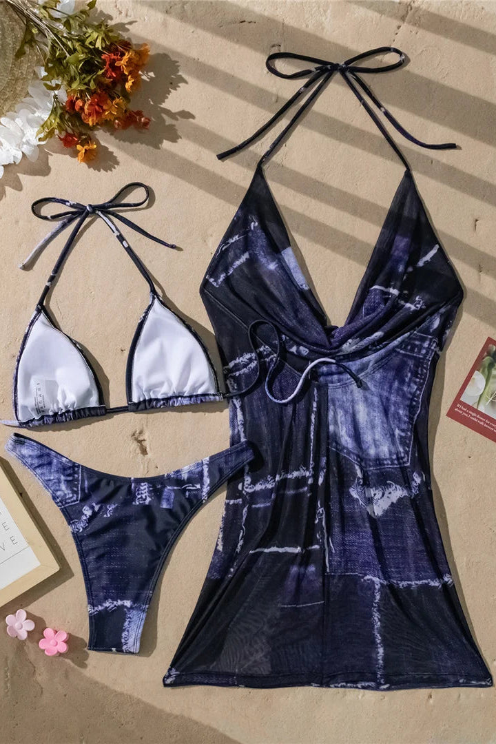 serves as a breezy beach cover up or elegant resort wear layer over the bikini set.